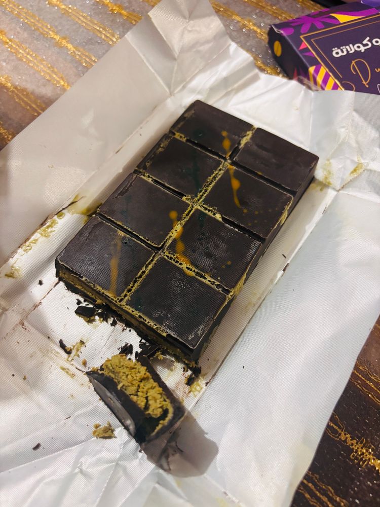 Knafeh dark chocolate, sliced open.