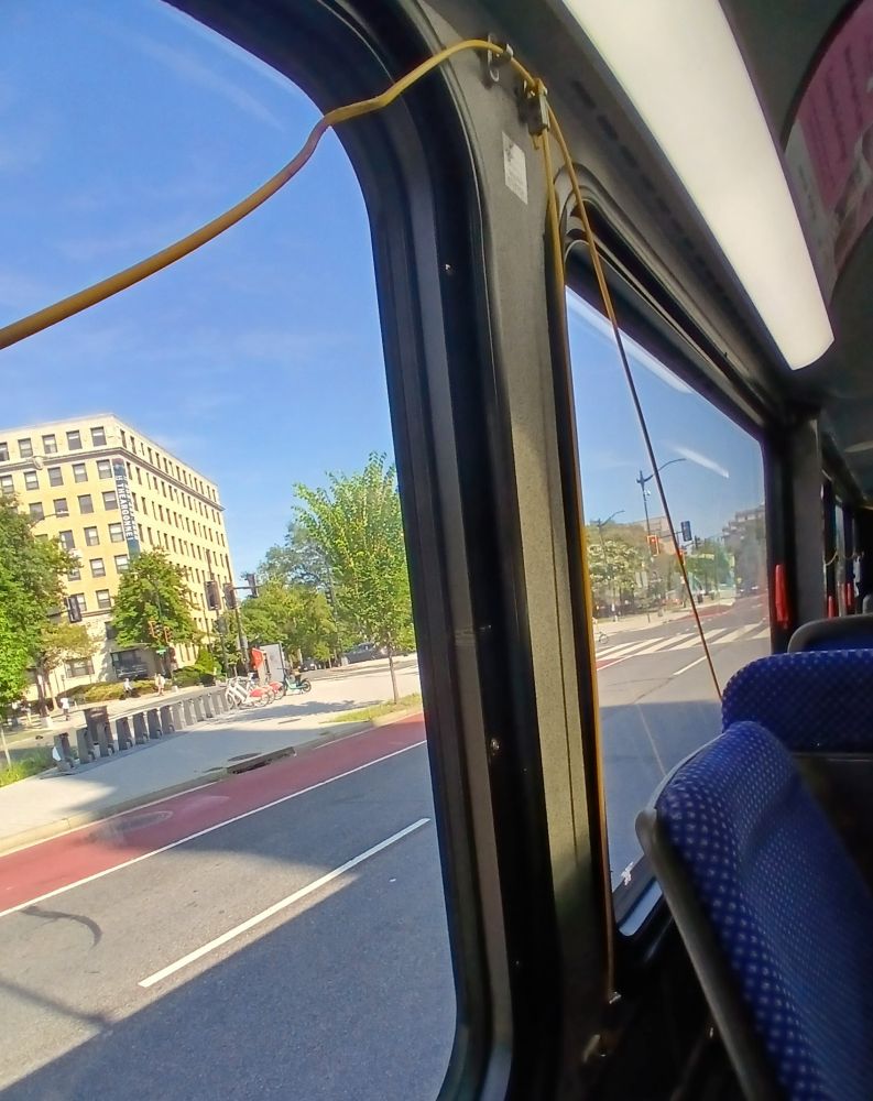 Bus windows with "stop request" cord dangling