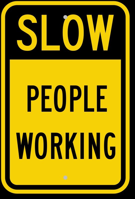 Sign; SLOW people working