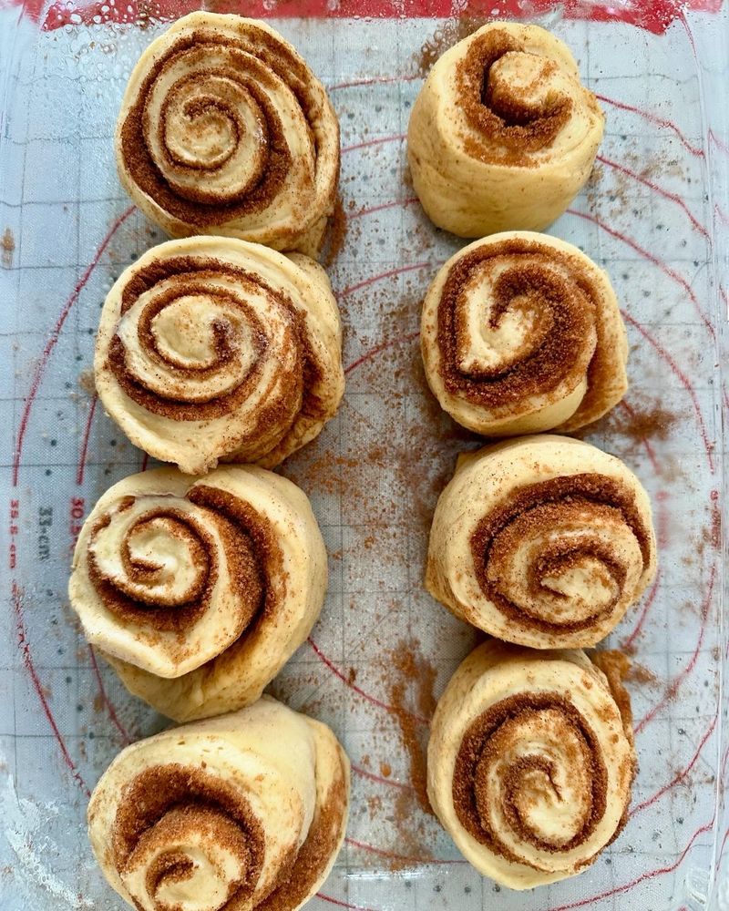 The cinnamon rolls before second proof and being baked