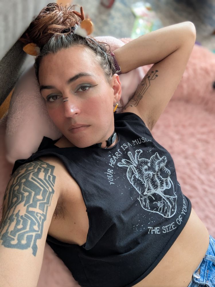 eri taking a selfie on a dog bed
