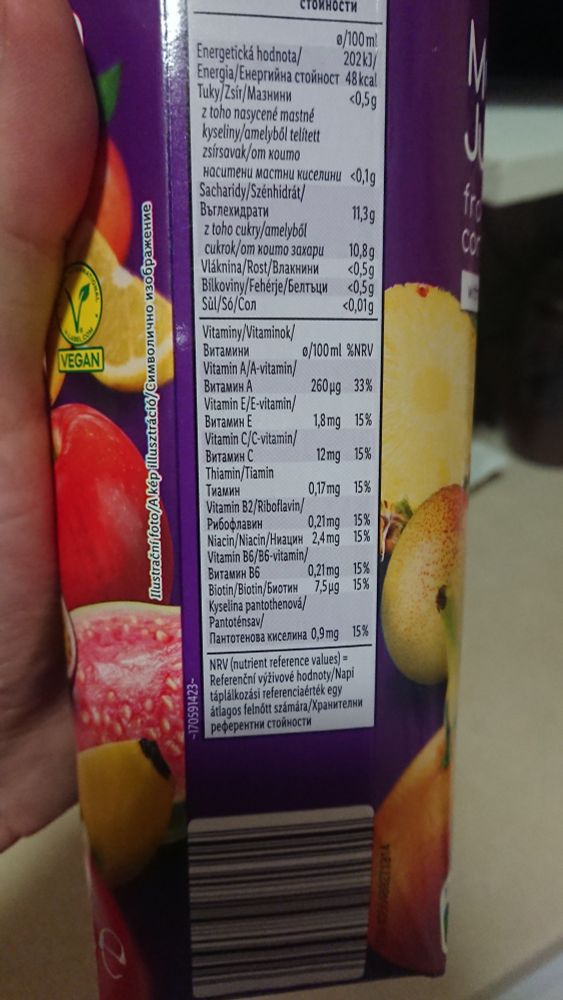 A box of 1L Solevita multivitamin juice. This frame shows the side of the box where the nutritional content is, dozed per 100ml:
Vitamin A, 33% of DRA/NRV
The rest are 15% of the Daily Recommended Allowance, each:
Vitamin E, vitamin C, thiamin, riboflavin, niacin, vitamin B6, biotin and pantothenic acid. Sugars are 10.8% of the 100ml. Biohacking juice!
