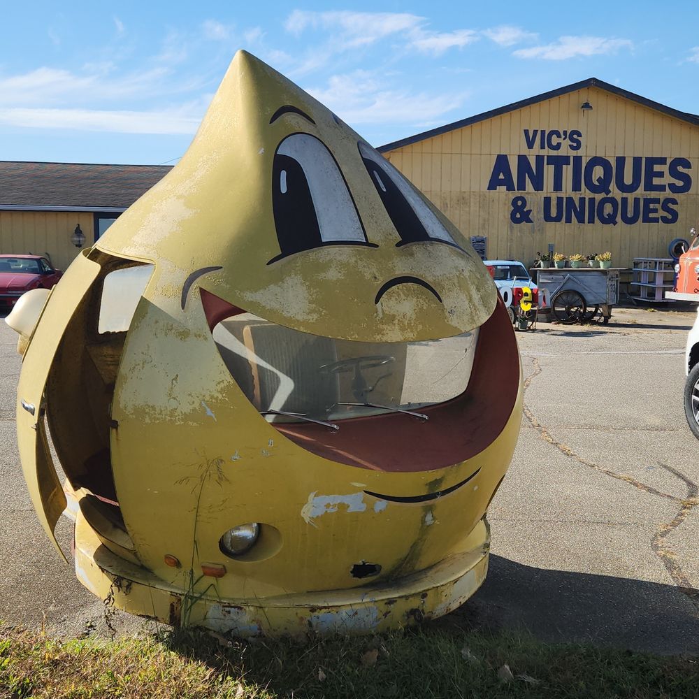 A strange little car made as an ad for an oil company.  It's shaped like an oil droplet, has a smiley face, and the windshield is in the huge smiley mouth.