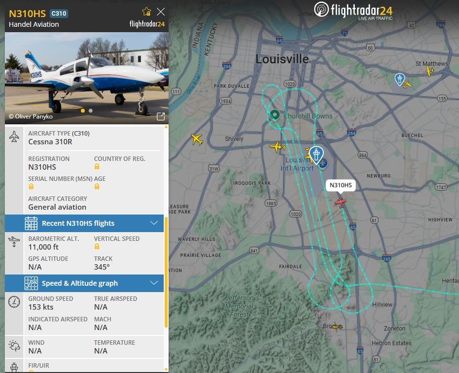 Flight tracker screen capture of an aerial survey plane running tracks over the crash site.