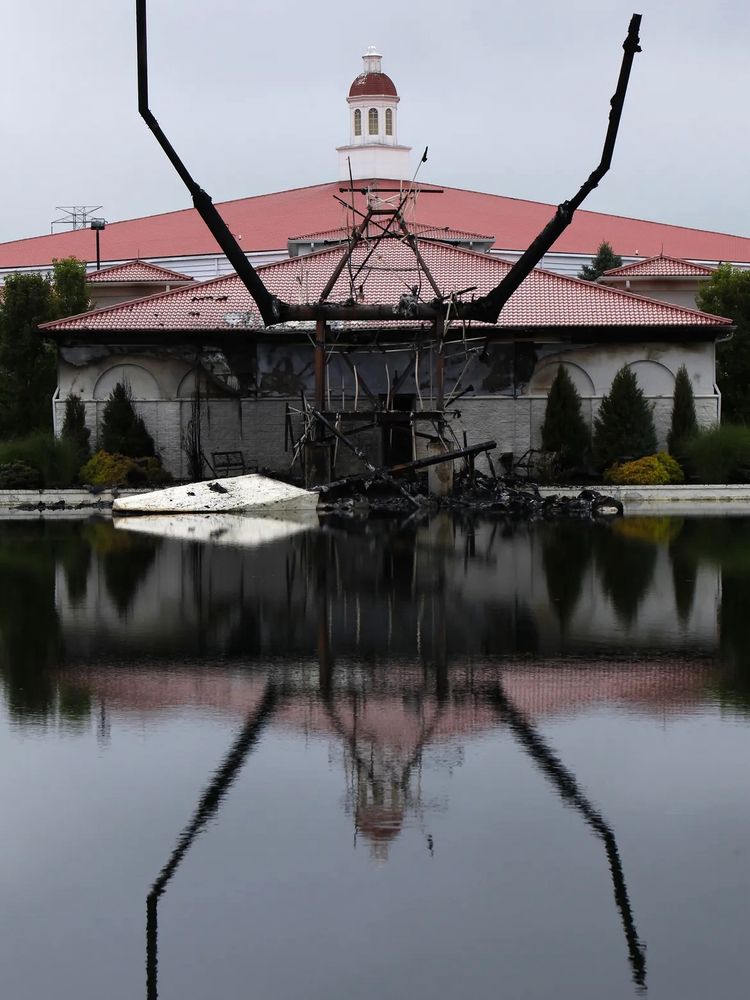 The charred remains of Touchdown Jesus after he got struck by lightning in 2010