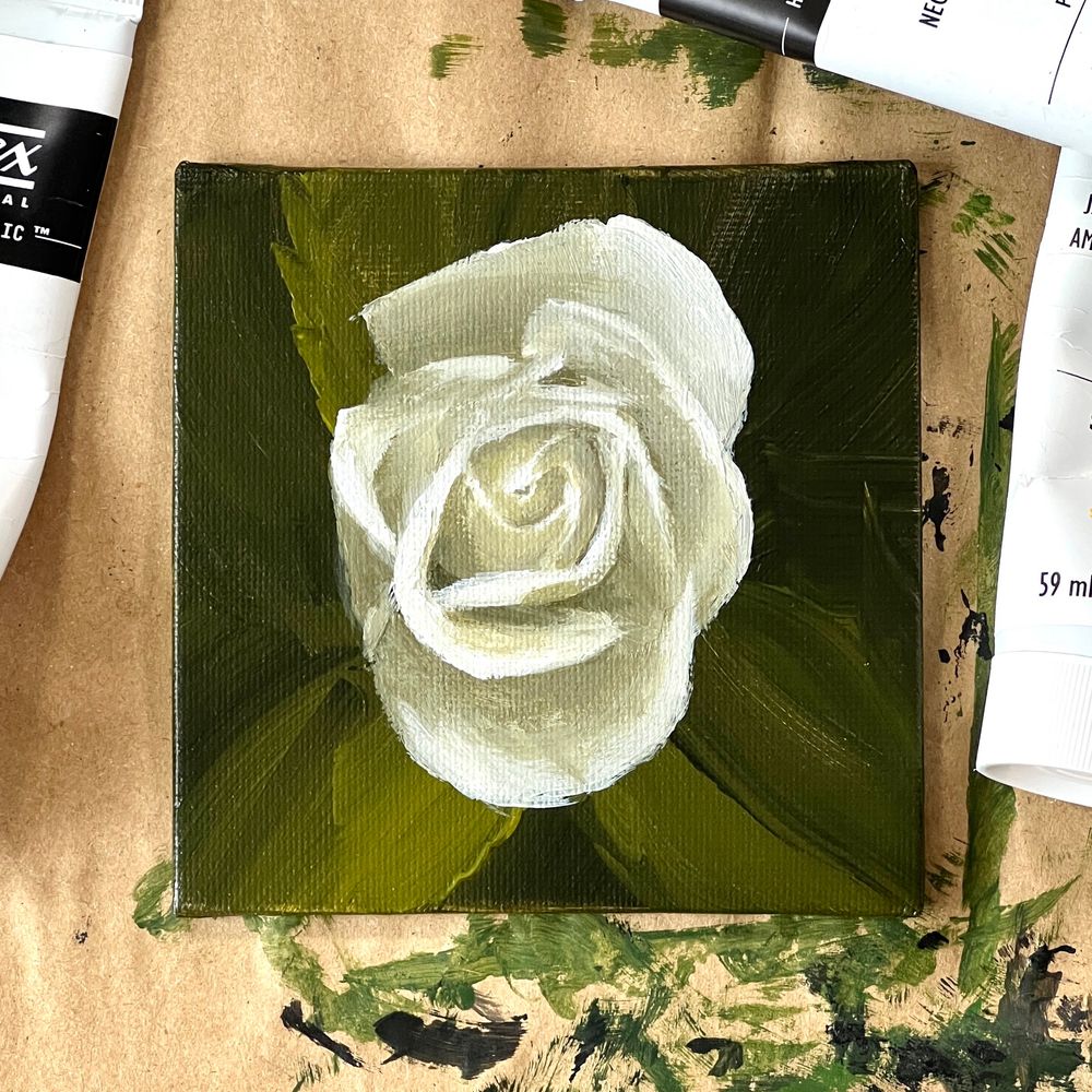 An acrylic painting of an unfurling rose flower.