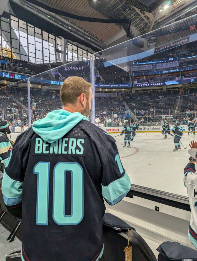 Beniers Jersey while watching pre-game warm-ups