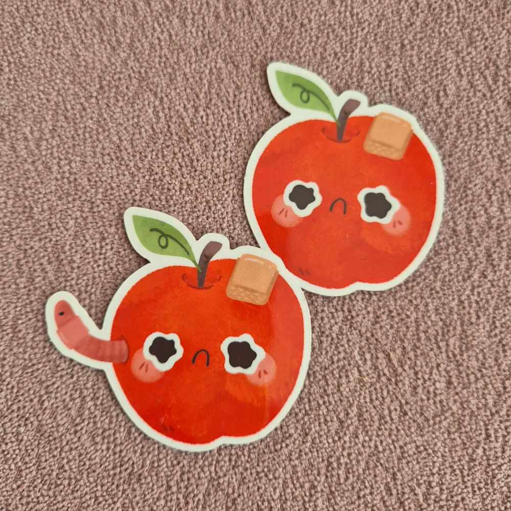 Sticker - trauriger Apfel mit Pflaster, einmal mit und einmal ohne Wurm.