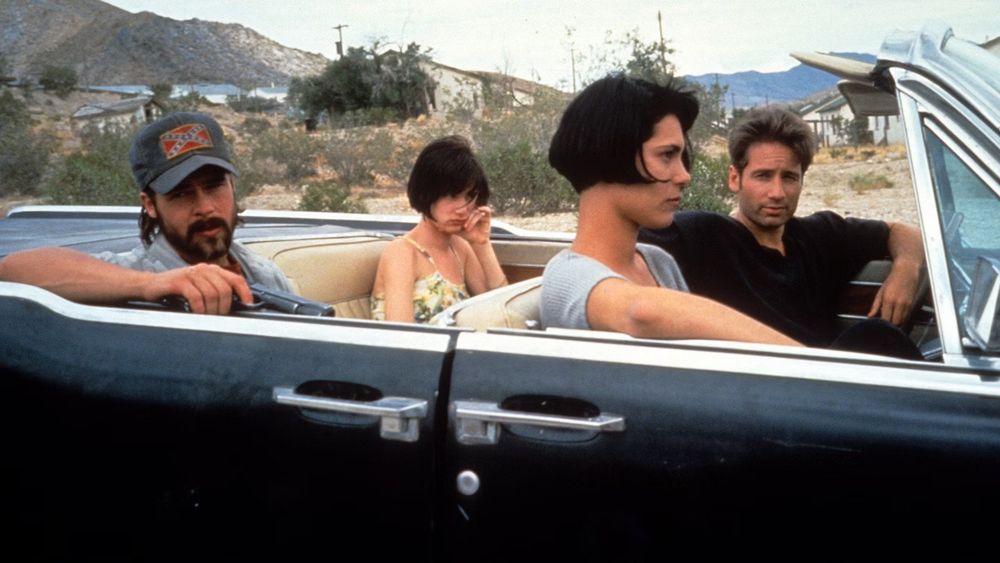 Brad Pitt, Juliette Lewis, Michelle Forbes and David Duchovny in a car scene from Kalifornia 