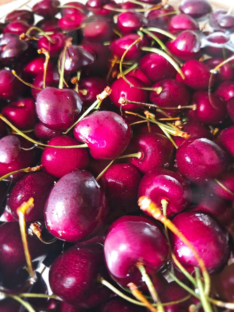 Four pounds of Washington State Cherries 🍒 getting a vinegar water bath before being consumed this week. 😋