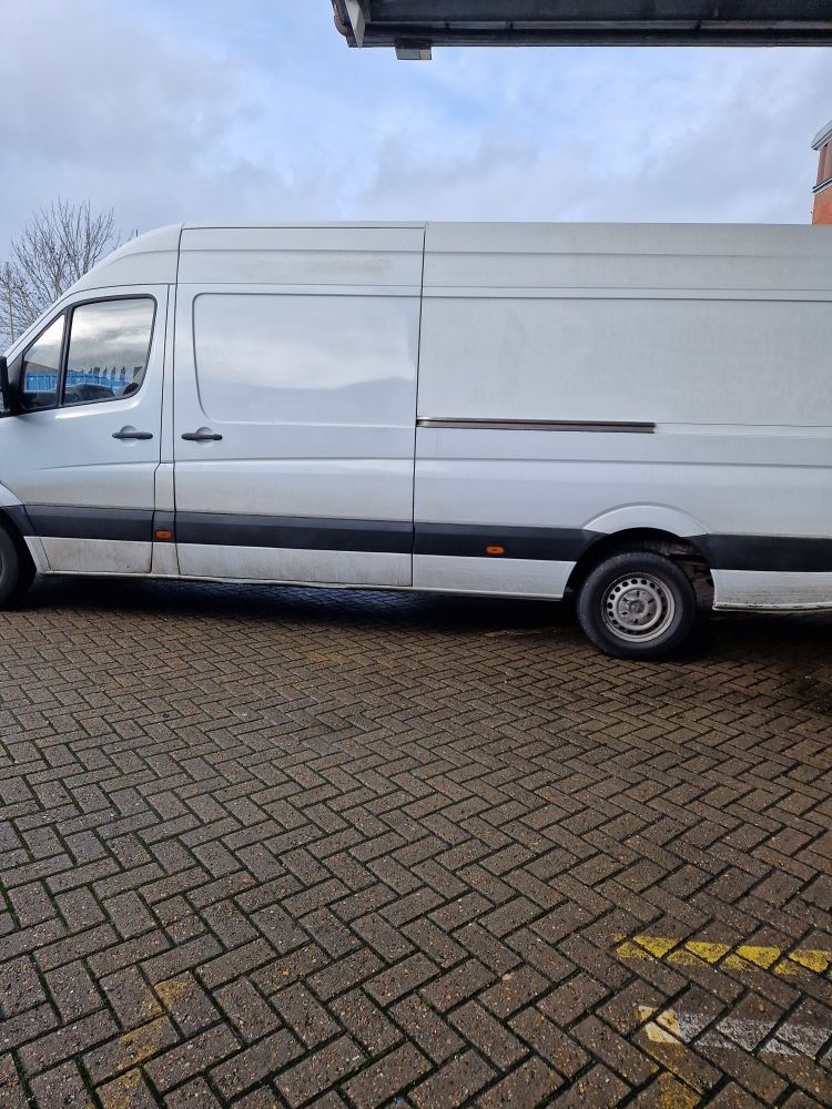 Side view of a long wheel base Mercedes-Benz Sprinter van