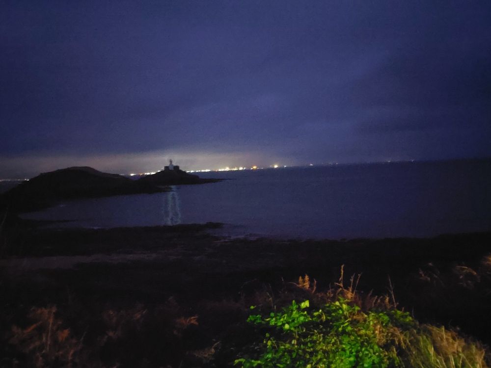 View of coast and lighthouse :0