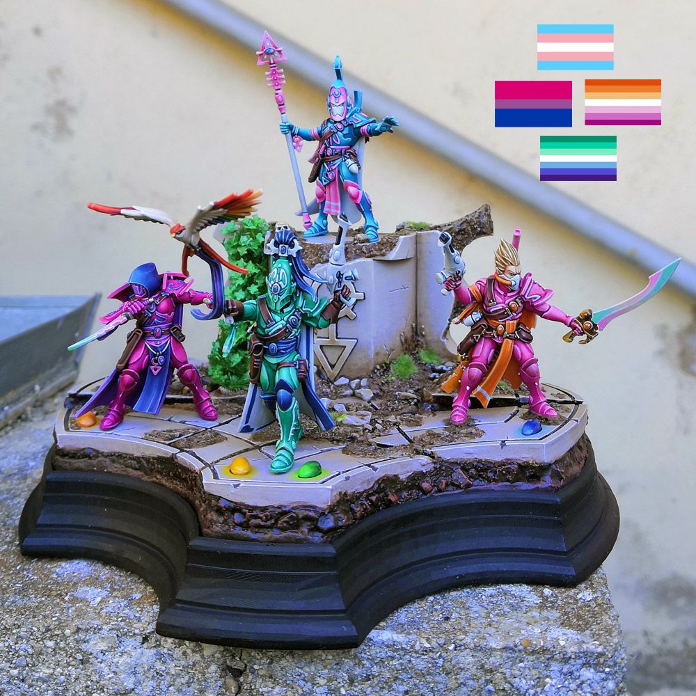 Eldar Corsair diorama.

3 Corsairs painted in the color or the bisexual, gay men and lesbian flag in front of a corsair in trans pride colors on a surelevation. The diorama base is an Eldar ruine adorned with the Eldar corsair symbole.