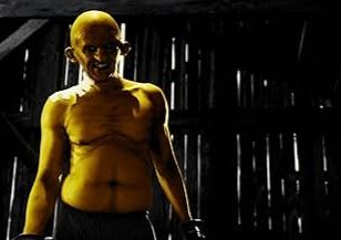 I shirtless picture of Roark Jr from Sin City. He is yellow, disgusting, and smells awful. 
