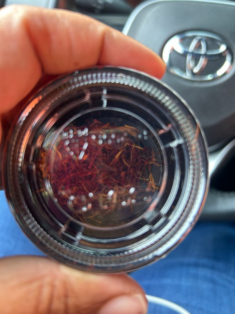 A small bit of saffron in plastic a to-go cup. 