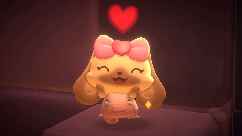 Screenshot from hello kitty island adventure showing ren’s character which is a blonde bunny wearing pink overalls and a pink bow doing the heart emote