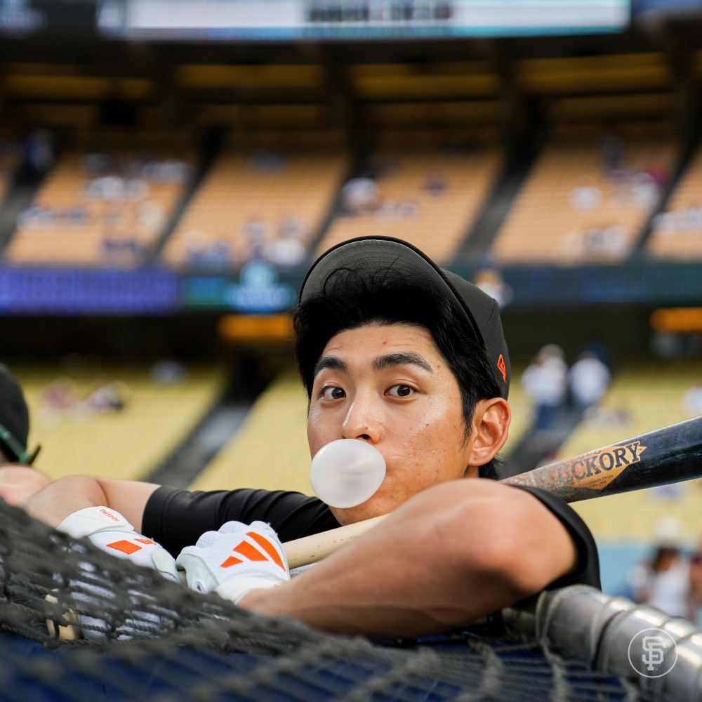 Jung Hoo Lee blowing a bubble