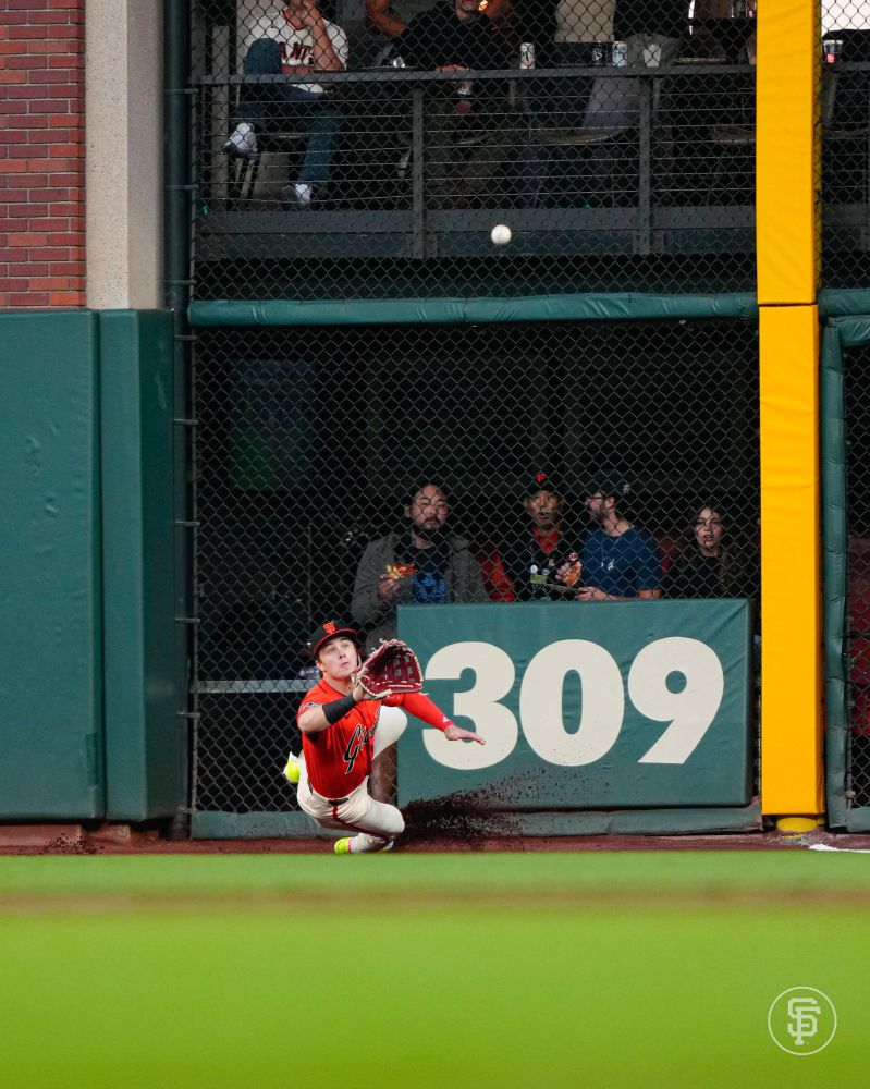 Drew Gilbert making a diving catch