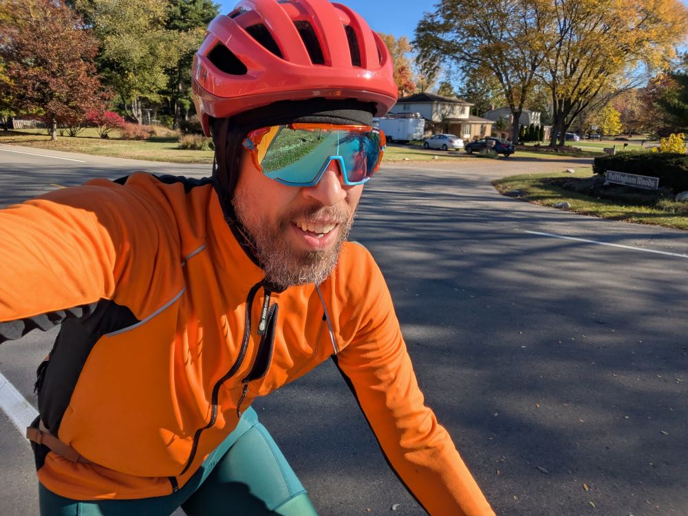 Silly man who likes the color orange out on a bike ride