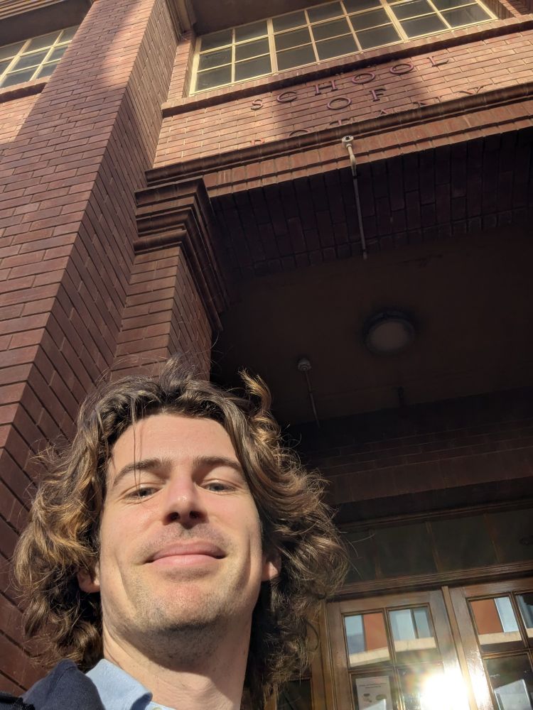 Selfie in front of entranceway 