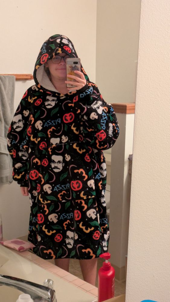 Same mirror selfie basically but the hood is up this time. It's so big. I love it