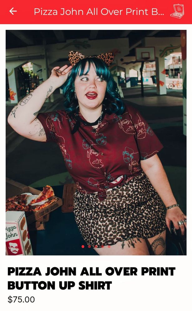 Screenshot of the pizza John all over print button up shirt from the pizzamas app, for $75. Picture of a model wearing it with a skirt and cat ears