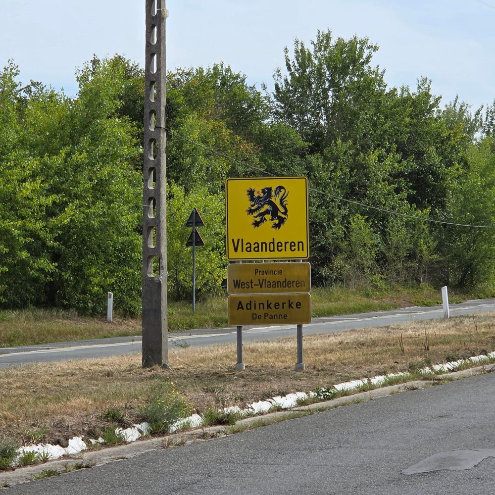 The sign beside the former border post, saying 'Vlaanderen' (Flanders).