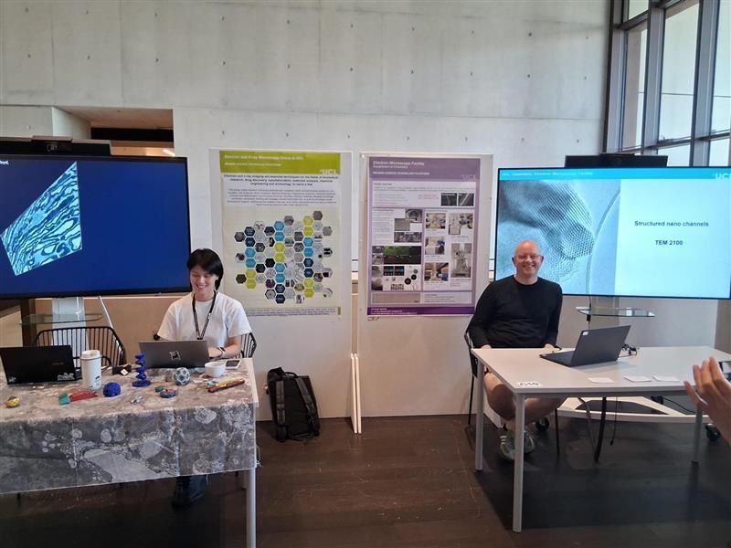 tables and poster boards of two exhibition stands celebrating the use of electron microscopy in research #electronmicroscopy 