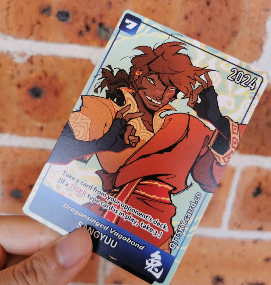 A photo of the front of the card, with the same image as the first but with a border and text. The text reads "Dragon-singed Vagabond Sangyuu", "2024", the chinese character for "hare", and the URL QTTSKY.carrd.co.