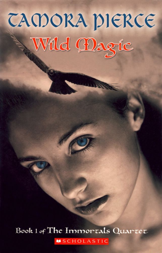 A cover of Tamora Pierce: Wild Magic (Book 1 of The Immortals Quartet), showing a teenage girl's face and a bird in light brown monocolor, with the girl's eyes in blue.