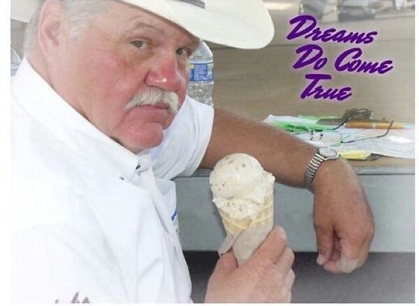 Picture of a distinguished gentleman with a fine mustache and  wearing a cowboy hat holding an ice cream cone wirh the caption, "Dreams Do Come True" 