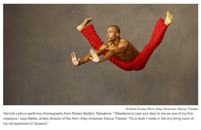 Photo of Alvin Ailey dancer Yannick Lebrun in Robert Battle's "Takademe".  He's wearing bright red ribbed bell bottom pants. Don't ask me how anyone can arrive at this position in mid-air except by way of superb physical strength, a lot of practice and a belief in ability to get there and come back safely. Photo credit Andrew Eccles of the Alvin Ailey American Dance Theater.