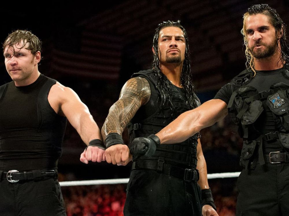 WWE Stable “The Shield” consisting of Roman Reigns, Seth Rollins, and Dean Ambrose (now Jon Moxley in AEW)