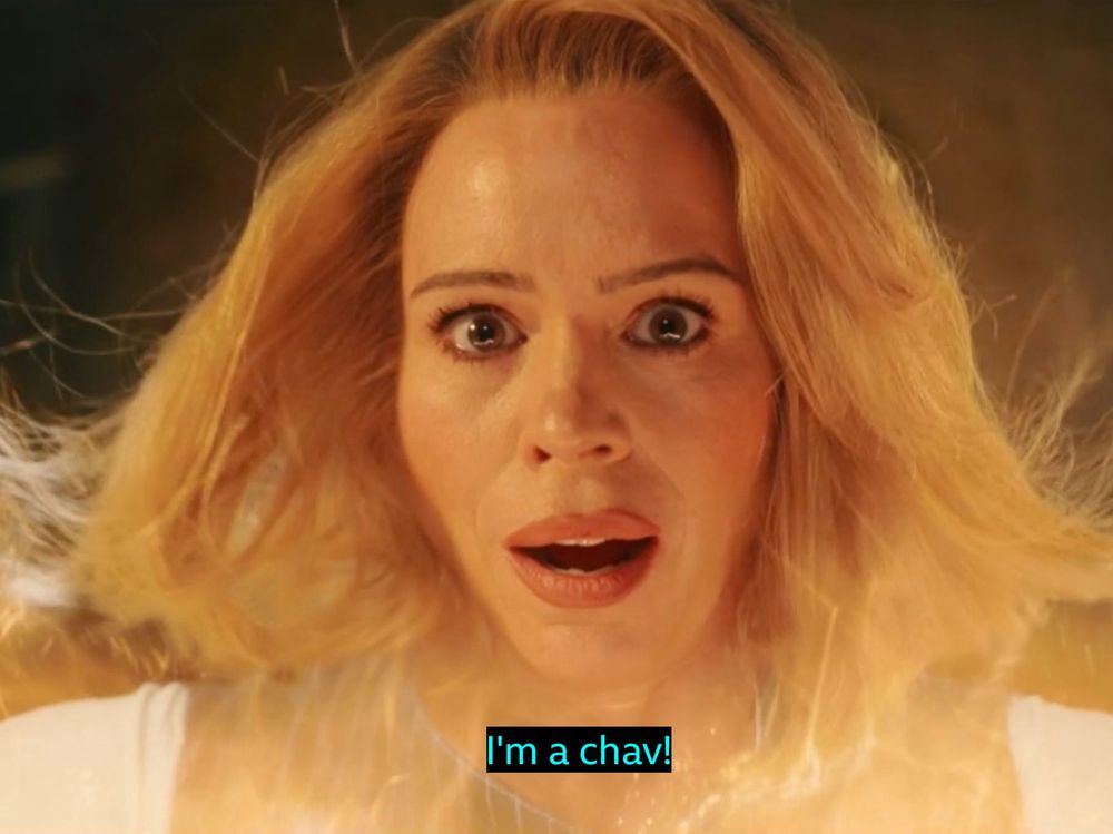 Billie Piper’s introduction as The Doctor, overlaid with the subtitle “I’m a chav!”.
