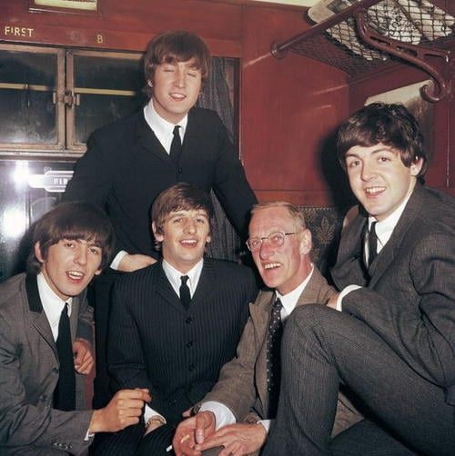 A photo of the Beatles and Wilfrid Brambell from A Hard Day's Night.