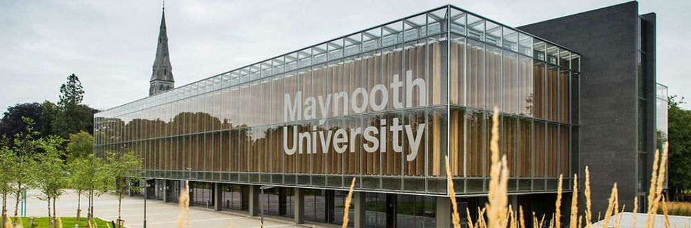 Image shows the external of Maynooth University in daylight.