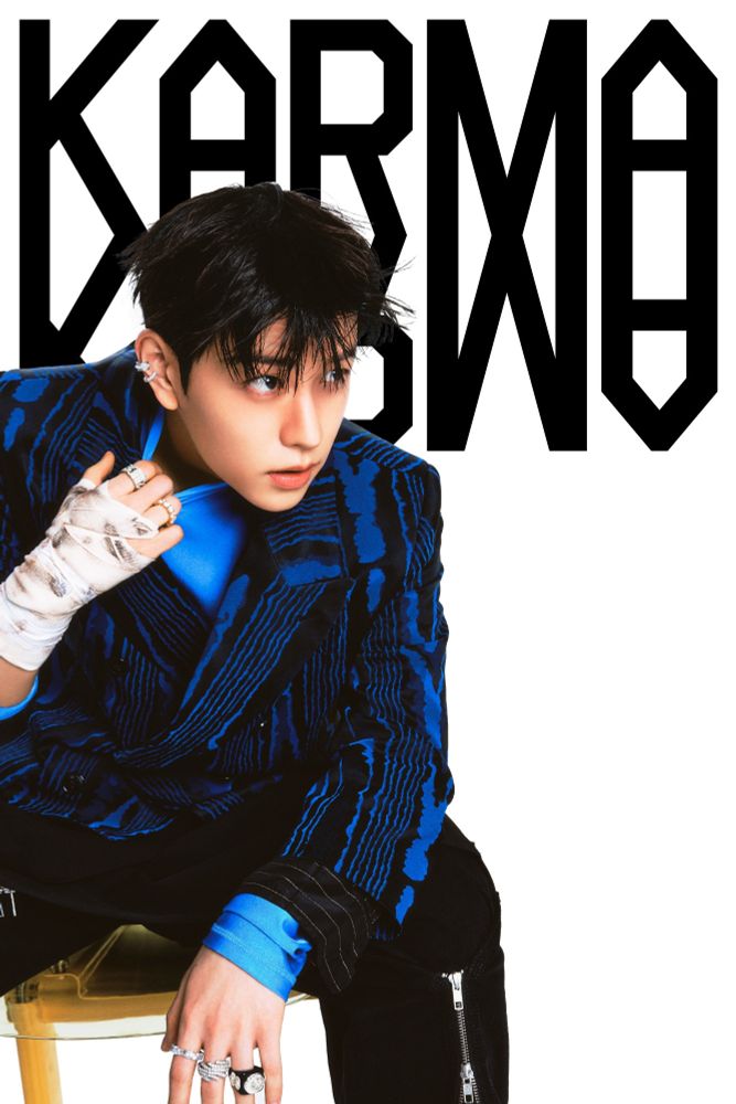 Seungmin's Karma photo concept, sat on a chair, pulling on his blue collar