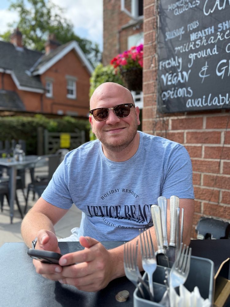 Josh at breakfast sitting out in the sun