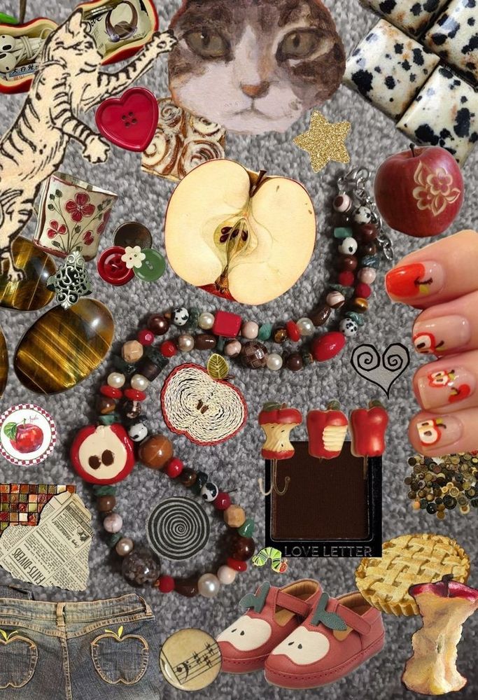 An apple y hemed beaded necklacr with a surrounding collage (red apple themed) including: red apple mary janes, an eaten apple core, a manicure, flowers carved onto a red apple, buttons