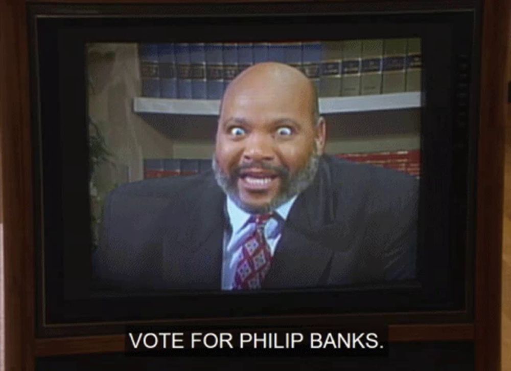 a tv screen shows a man in a suit and tie and the words vote for philip banks