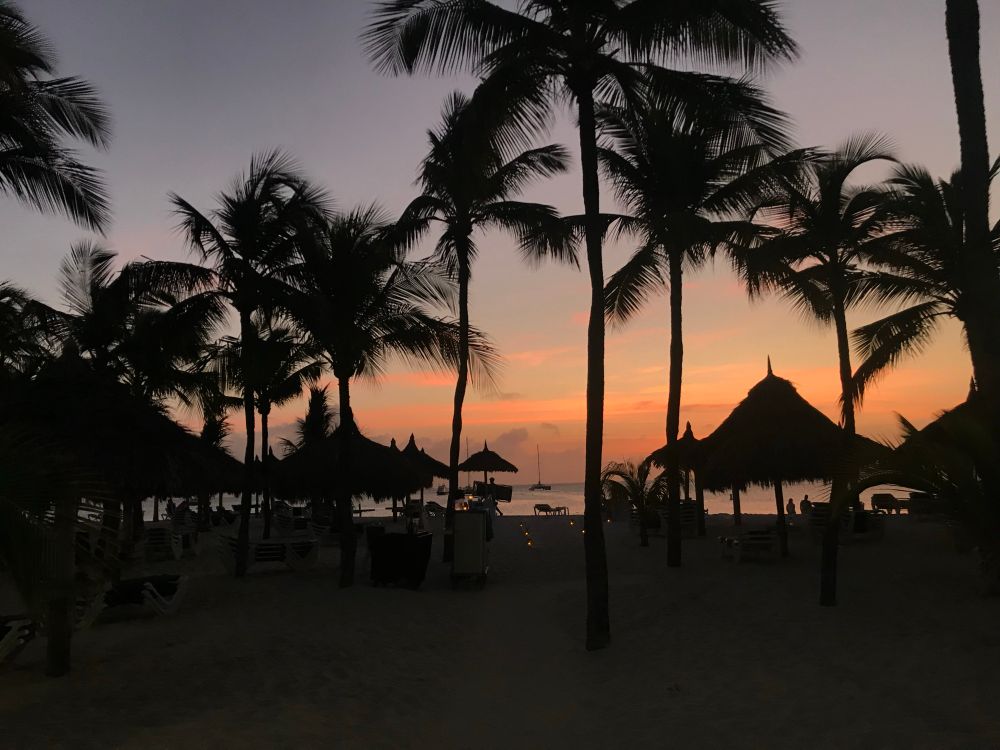 a picture of the sky at sunset in aruba