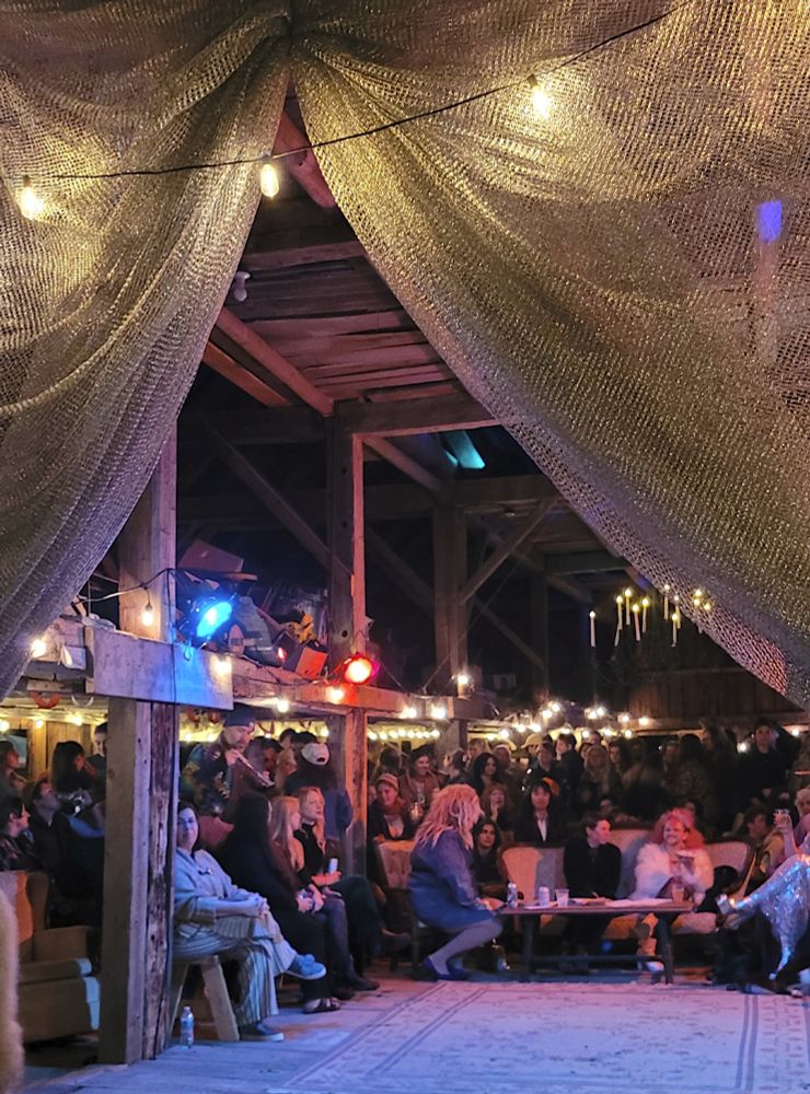 Upcycled barn full of people