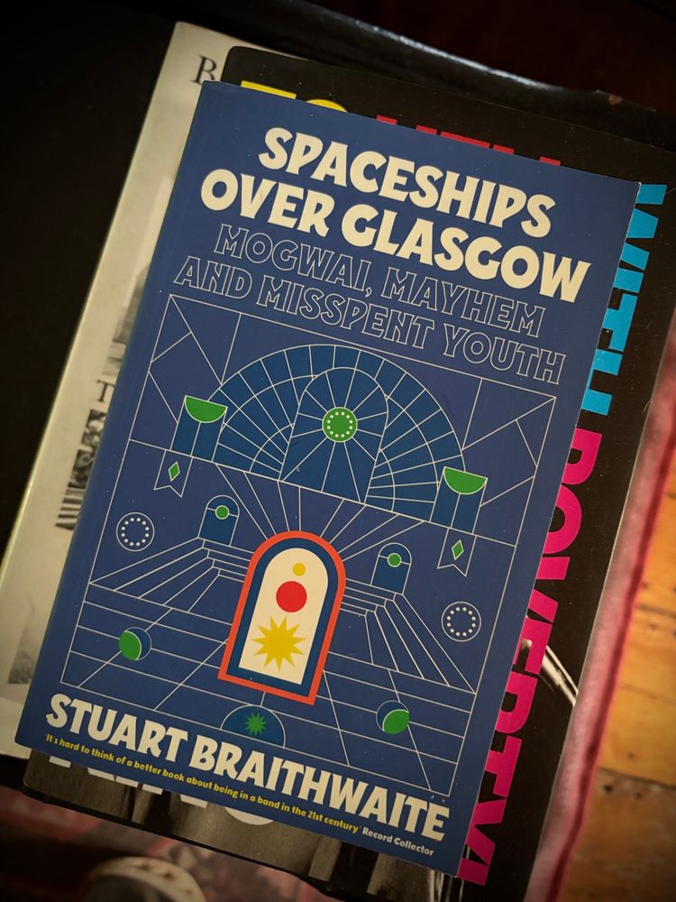 The cover of a book titled “Spaceships over Glasgow,” by Stuart Braithwaite.