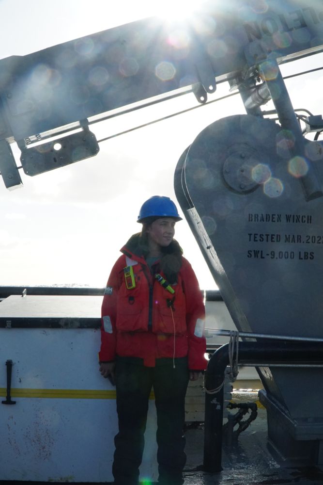Daniella stands on the deck of the RV Atlantic Explorer during the C-CoMP March 2025 cruise. Photo by Fadime Stemmer. 