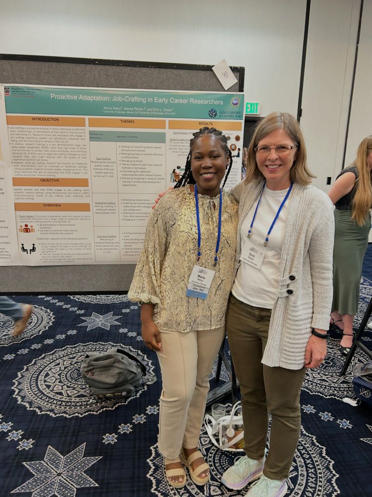 Marie Delcy and Dr. Erin Dolan stand in front of Marie's poster at the 2025 Society for the Advancement of Biology Education Research (SABER) Meeting. Photo provided by Erin Dolan.