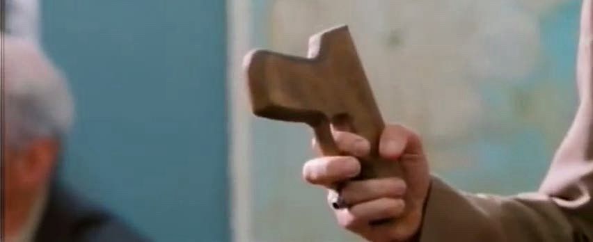 The wooden side arm from the other guys, with a fresh linseed oil stain to it. 