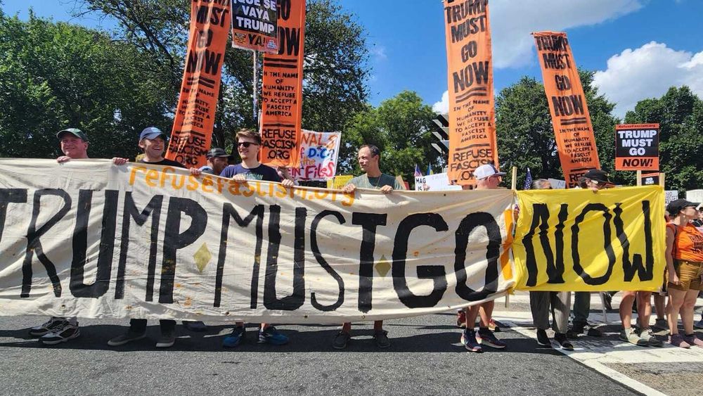 Protesters marched to the White House on Saturday as D.C. Metropolitan Police officers and National Park Service police looked on from a distance.