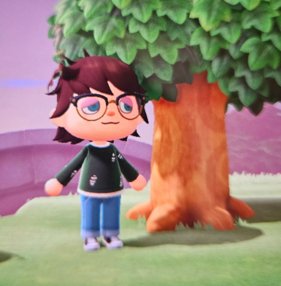 Animal crossing character with medium-length, messy hair, with a black lily in it, wearing a dark forest green thread-worn sweater, and straight length blue jeans, and black converse.