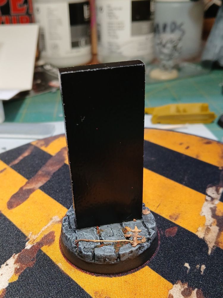 Painted "monolith" objectives marker from Dragon Forge Design.