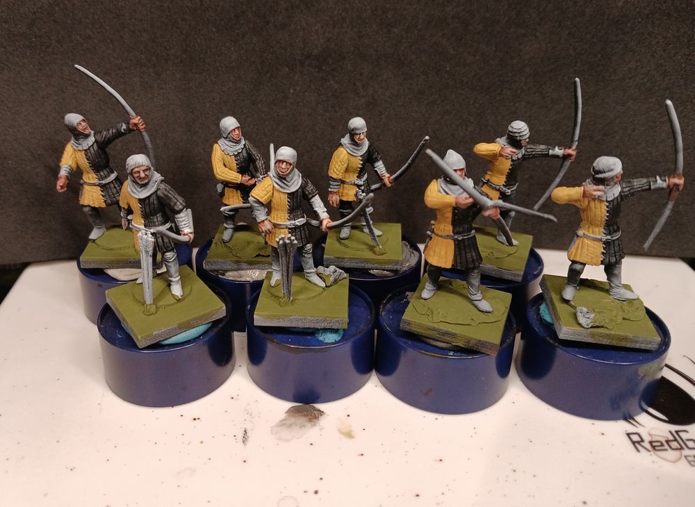 WIP of a set of archers in black and yellow from Perry Miniatures for use in SAGA: Age of Chivalry.